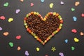 Brown coffee solated on black texture background for design. Saint Valentine's Day card on fabruary 14, holiday concept. Royalty Free Stock Photo