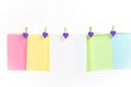 Colorful paper cards hanging rope isolated on white background. Royalty Free Stock Photo