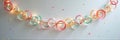 Colorful paper chain garland with confetti on white background Royalty Free Stock Photo