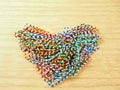 Colorful paper clips, place heart shape Royalty Free Stock Photo