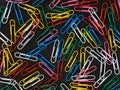 Colorful paper clips randomly organized
