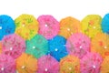 Colorful paper cocktail umbrellas close-up on a white Royalty Free Stock Photo