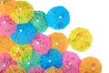 Colorful paper cocktail umbrellas close-up on a white Royalty Free Stock Photo