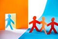 Colorful paper cut figures - group of people at the door, welcome or unwanted Royalty Free Stock Photo