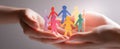 The colorful paper figures symbolize unity and support in a caring community..AI generated image Royalty Free Stock Photo