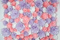 Colorful paper flowers background. Floral backdrop with handmade roses for wedding day or birthday. Royalty Free Stock Photo