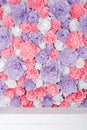 Colorful paper flowers background. Floral backdrop with handmade roses for wedding day or birthday. Royalty Free Stock Photo