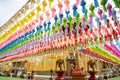 Colorful paper lanterns hanging for worship or respect of buddha in Thai temple