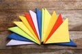 Colorful paper napkins on wooden background Royalty Free Stock Photo