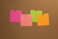 Colorful paper notes pinned to cork board Royalty Free Stock Photo