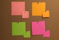 Colorful paper notes pinned to cork board Royalty Free Stock Photo