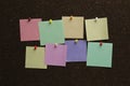 Colorful paper notes pinned to cork board Royalty Free Stock Photo