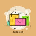 Colorful paper shopping bags with handles. Concept of buying goods, sales and discounts, online and offline commerce