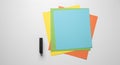 colorful paper stack with black device on white Royalty Free Stock Photo