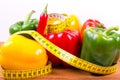 Colorful paprika and measuring tape, Diet concept