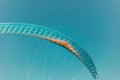 Colorful paraglider close-up against the blue sky