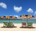 Colorful parasols and deck chairs Royalty Free Stock Photo