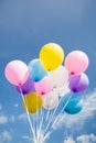 Colorful party balloon floating in mid air