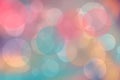 Colorful party invitation background. Abstract pastel blue pink yellow texture with blurred bokeh lights and soft color circles. Royalty Free Stock Photo