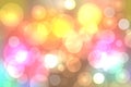 Colorful party invitation background. Abstract pastel yellow pink texture with blurred bokeh lights and soft color circles. Royalty Free Stock Photo