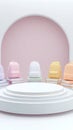 Colorful pastel backpacks on podium in minimalist display setting Royalty Free Stock Photo
