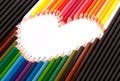 Colorful pastel pencil arrange in heart shape