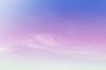 Colorful pastel sunrise or sunset sky with puffy fluffy soft clouds & white cloudscape Royalty Free Stock Photo