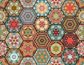 Colorful patchwork pattern in ethnic style. Hexagonal ceramic tiles with bright ornament. Seamless vector design Royalty Free Stock Photo