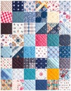 Colorful Patchwork Quilt Featuring Geometric and Floral Fabric Square Designs Royalty Free Stock Photo