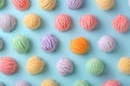 Colorful pattern of ice cream scoops of different colors and flavors on pastel background, top view