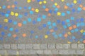 Colorful pattern of painted squares on a street