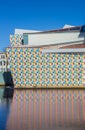 Colorful pattern reflected in the frozen water of the canal in Groningen