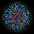 Colorful pattern in style of Gothic stained glass window with round frame. Abstract floral ornament Royalty Free Stock Photo