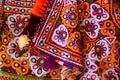 Colorful pattern and texture in cloth,Indian patchwork carpet in Rajasthan, Asia, Unidentified man embroidering cloth in