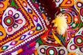 Colorful pattern and texture in cloth,Indian patchwork carpet in Rajasthan, Asia, Unidentified man embroidering cloth in