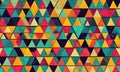 A colorful pattern of triangles is displayed on a wall. Royalty Free Stock Photo