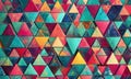 A colorful pattern of triangles is displayed on a wall. Royalty Free Stock Photo