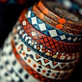 Colorful patterned ethnic bracelets on a dark background, close-up Royalty Free Stock Photo