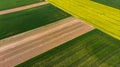 Colorful patterns in crop fields at farmland, aerial view, drone photo