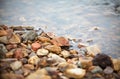 Colorful pebble, clear water with gravel at side of the lake, imafe for background