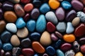 colorful pebbles texture background, closeup multicolored smooth stones