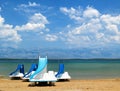 Colorful pedalos on a beautiful tropical beach Royalty Free Stock Photo