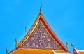 The colorful pediement of the shrine in Wat Mahathat temple in Bangkok, Thailand Royalty Free Stock Photo