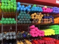 Colorful pen being arranged in a shelf for sale. Royalty Free Stock Photo