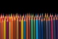 Colorful pencil arrangement, academic vector backdrop in vivid spectrum