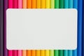 Colorful pencil crayon education background with a card