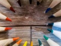 Colorful pencil crayons lie in a circle Royalty Free Stock Photo