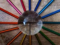 Colorful pencil crayons lie in a circle Royalty Free Stock Photo