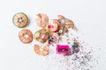 Colorful pencil shavings and sharpener on white background. Royalty Free Stock Photo