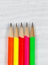 Colorful Pencil Tips on wooden desktop Royalty Free Stock Photo